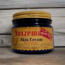 VINTAGE NOXZEMA GLASS COBALT JAR W/ORIGINAL TIN LID - BOTTOM OF JAR IS EMBOSSED