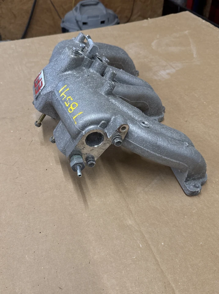 Colector de admisión Toyota Land Cruiser OEM 3FE FJ 60 FJ62 FJ 80. Foto 4 de 4