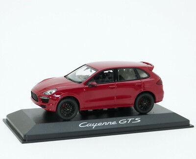 A collectible scale model Porsche Cayenne Diesel from Minichamps