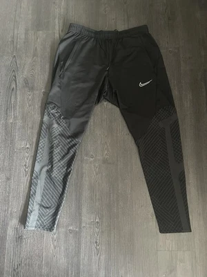 Nike Dri-FIT Men’s Slim Tapered Track Pants Black/Grey Geometric Size L - Image 1 of 4