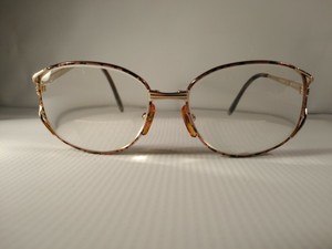 luxottica titanium eyeglass frames