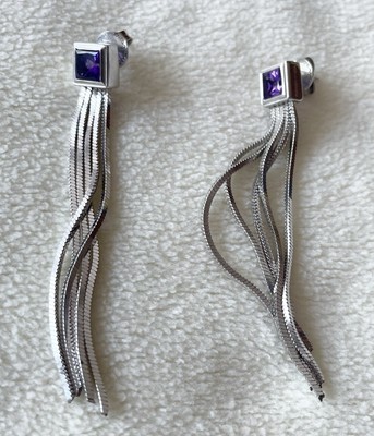 Ausgefallene Ohrstecker von Pianegonda aus 925 Silber mit Amethyst.