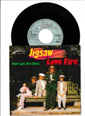 Jigsaw - Love Fire (1976) Vinyl 7` inch Single Vg