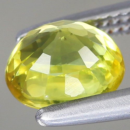 0,83ct 5,6x4,5mm ovaler natürlicher beheizter grünlichgelber Saphir-Songea, Tansania - Bild 2 von 4