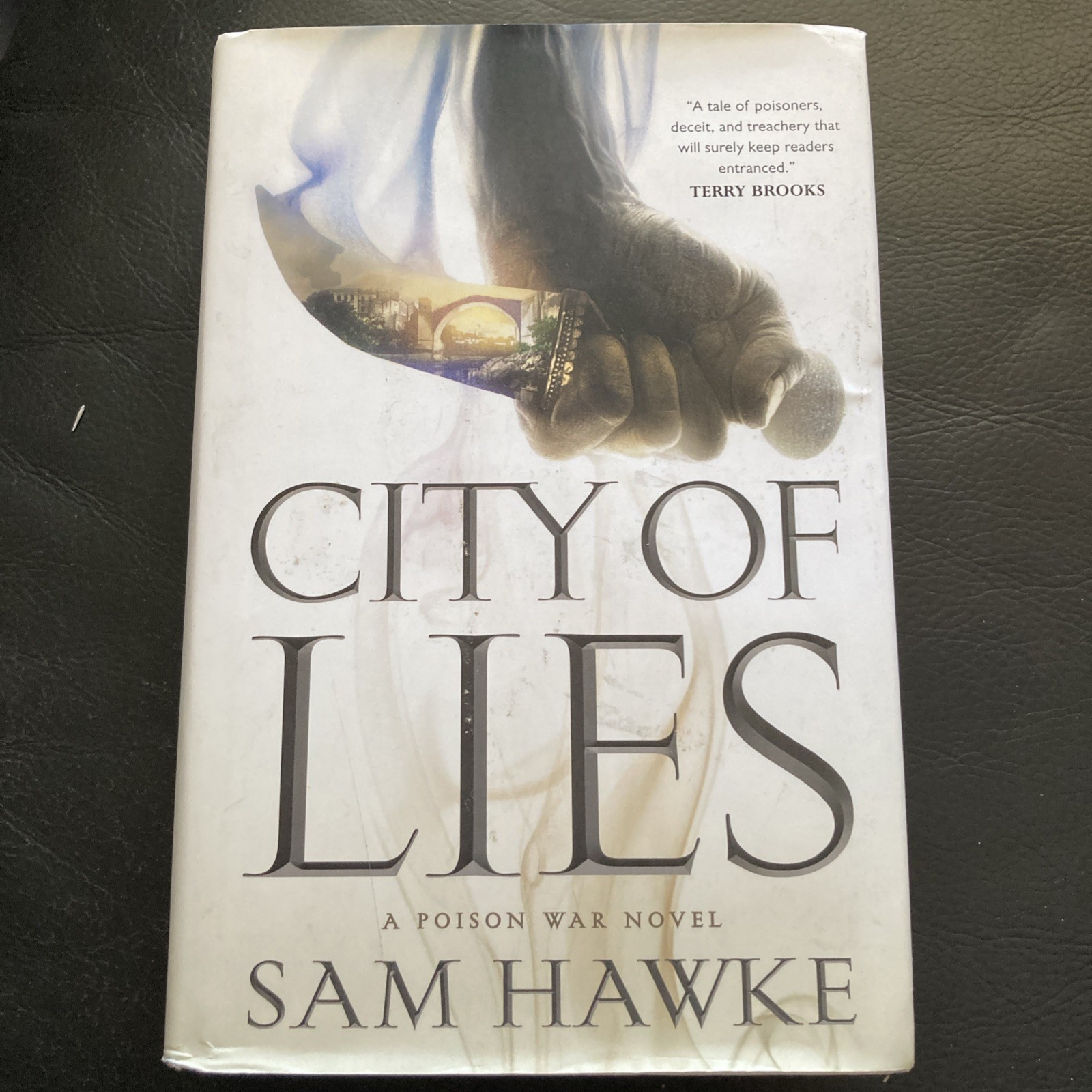 City of Lies : A Poison War Novel by Sam Hawke (2018, Hardcover) - Free Postage
