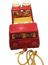 Vintage Johnson & Johnson Rhythm Roller Pull Toy Red Truck 1982
