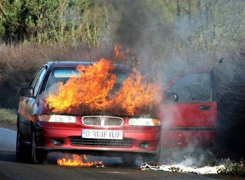 Photo 6x4 Car on fire, Junction Road near Udiam Snagshall The vehicle bur c2007