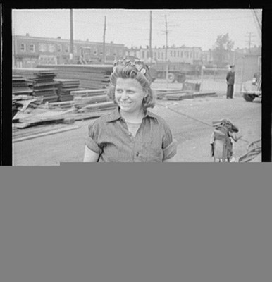 Bethlehem-Fairfield shipyards, Baltimore, Maryland. A sturdy girl worker with a