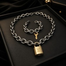 Authentic Louis Vuitton Gold Padlock Lick & U...