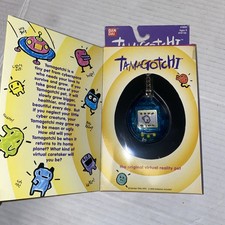 Vintage Tamagotchi Virtual Digital Pet Translucent Blue Bandai 1996-1997 BNIB