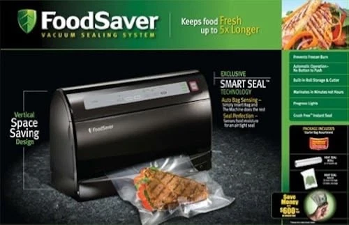 BLACK FOODSAVER VACUUM SEALING SYSTEM W/6 NEW VACUUM SEALER ROLLS