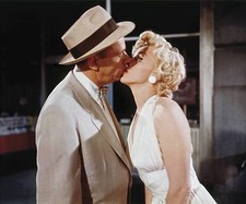 Marilyn Monroe kisses co star Tom Ewell while wearing a white dres- Old Photo