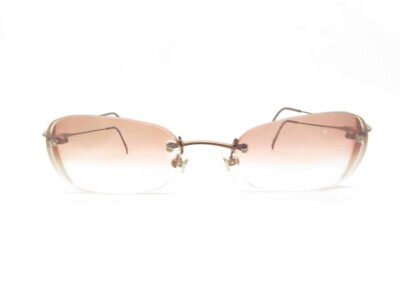 CALVIN KLEIN 522S RIMLESS BROWN WRAP TITANIUM