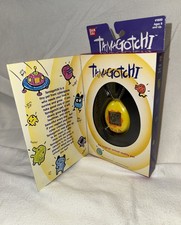 New in Box BANDAI Original 1996/1997 Tamagotchi Virtual Pet Yellow/ Orange 1800