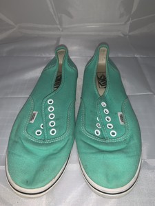 teal blue vans