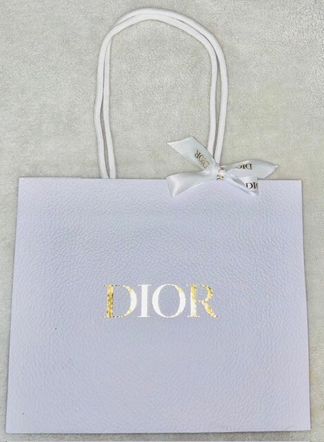 Authentique sac shopping Christian Dior galet blanc accents dorés et ruban 10x9x5