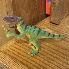 2009 Velociraptor Green Black Stripes Yellow Purple Dino approx 6" long  3.5" t