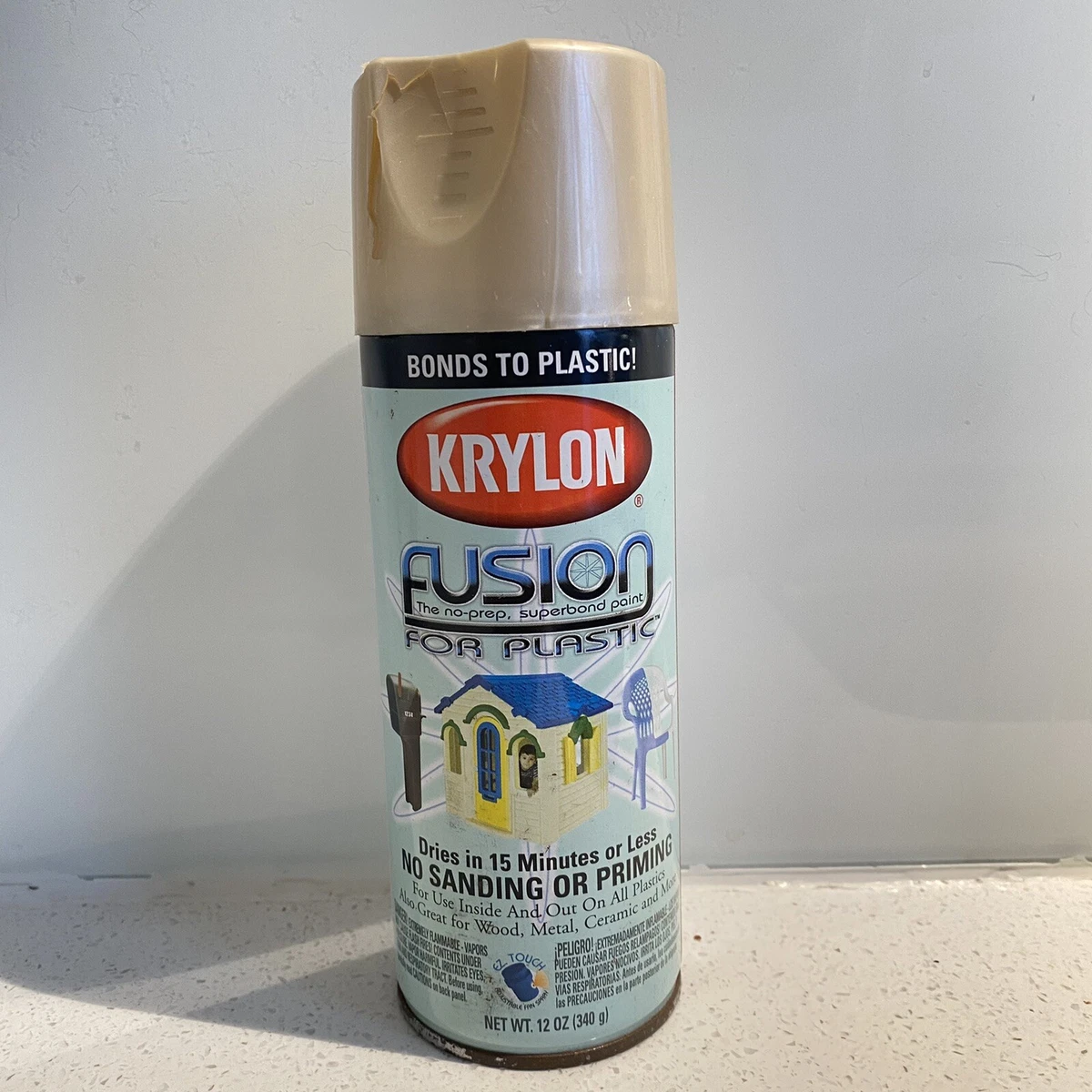 Spray paint that bonds to cheap plastic