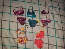 LOT OF BARBIE DOLL SWIMSUITS 8