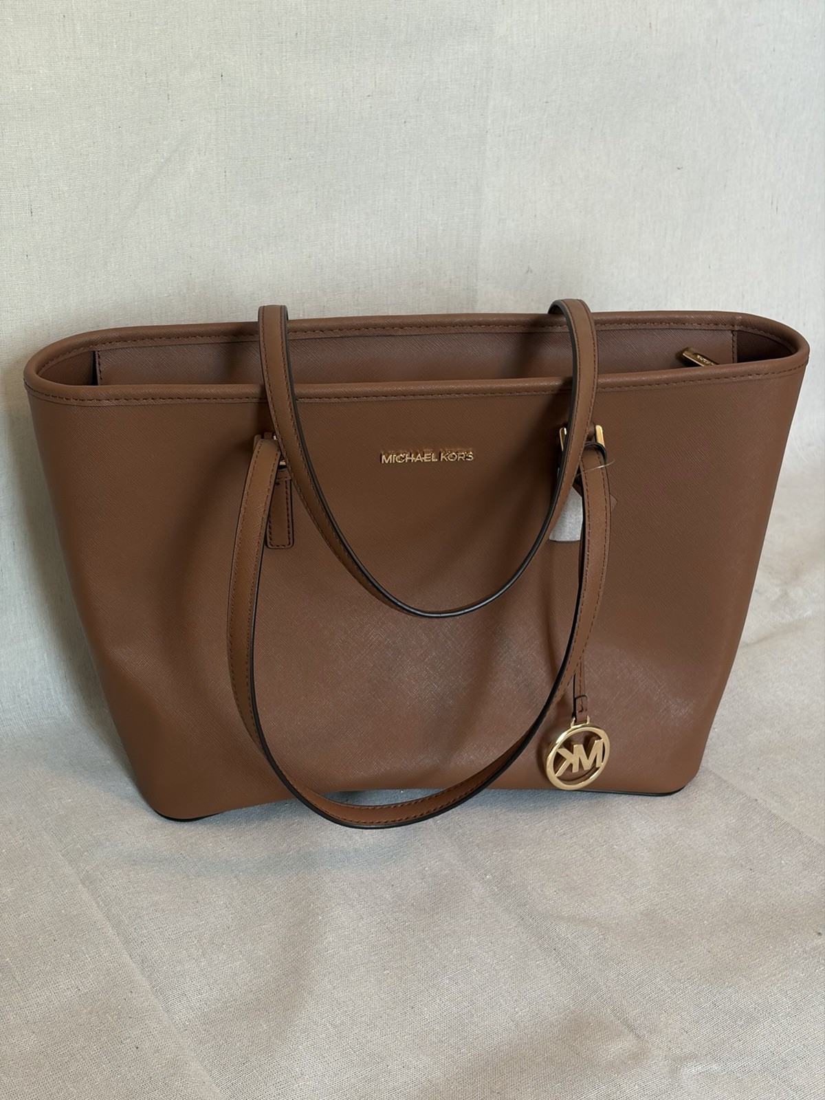 NWT Michael Kors Jet Set Large Saffiano Leather Tote Bag Brown Luggage MK Charm
