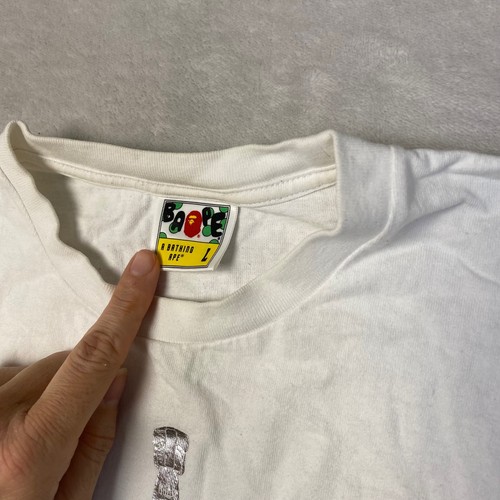 T-shirt grafica BAPE A Bathing Ape viso di squalo bianca uomo taglia L MACCHIE invecchiate - Foto 2 di 11