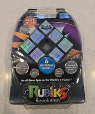 RUBIK’S REVOLUTION NO. 3000 6-ELECTRONIC GAMES CUBE 2007 BRAND NEW SEALED