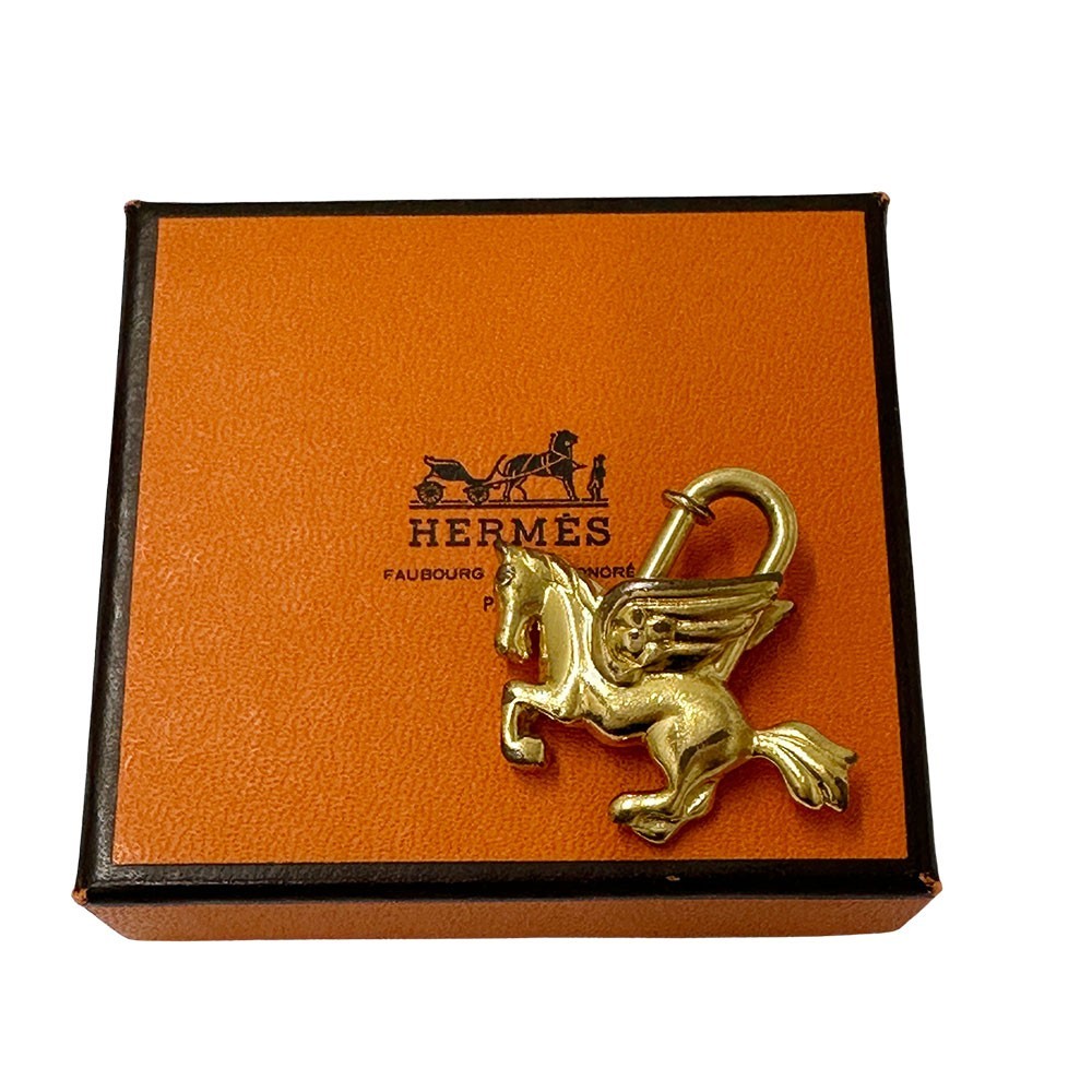 HERMES ゴールド 翼のある馬のチャーム HERMES ゴールド 翼のある馬のチャーム