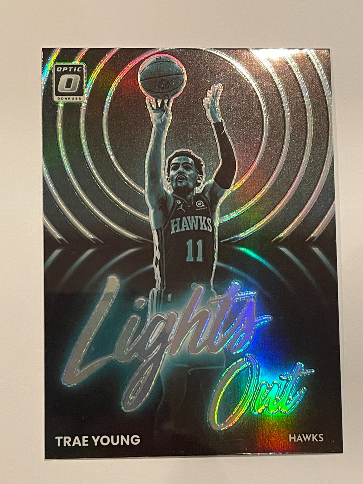 2022-23 Panini Donruss Optic Hawks Trae Young Lights Out Silver Prizm Insert #8