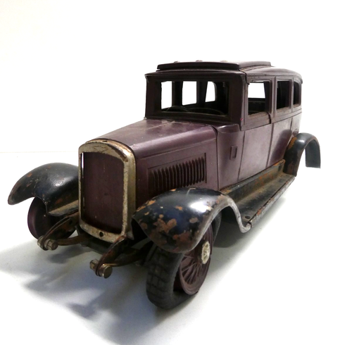 RARE ANTIQUE RANLITE PRESSED METAL MAROON BAKELITE CLOCKWORK SALOON CAR MODEL