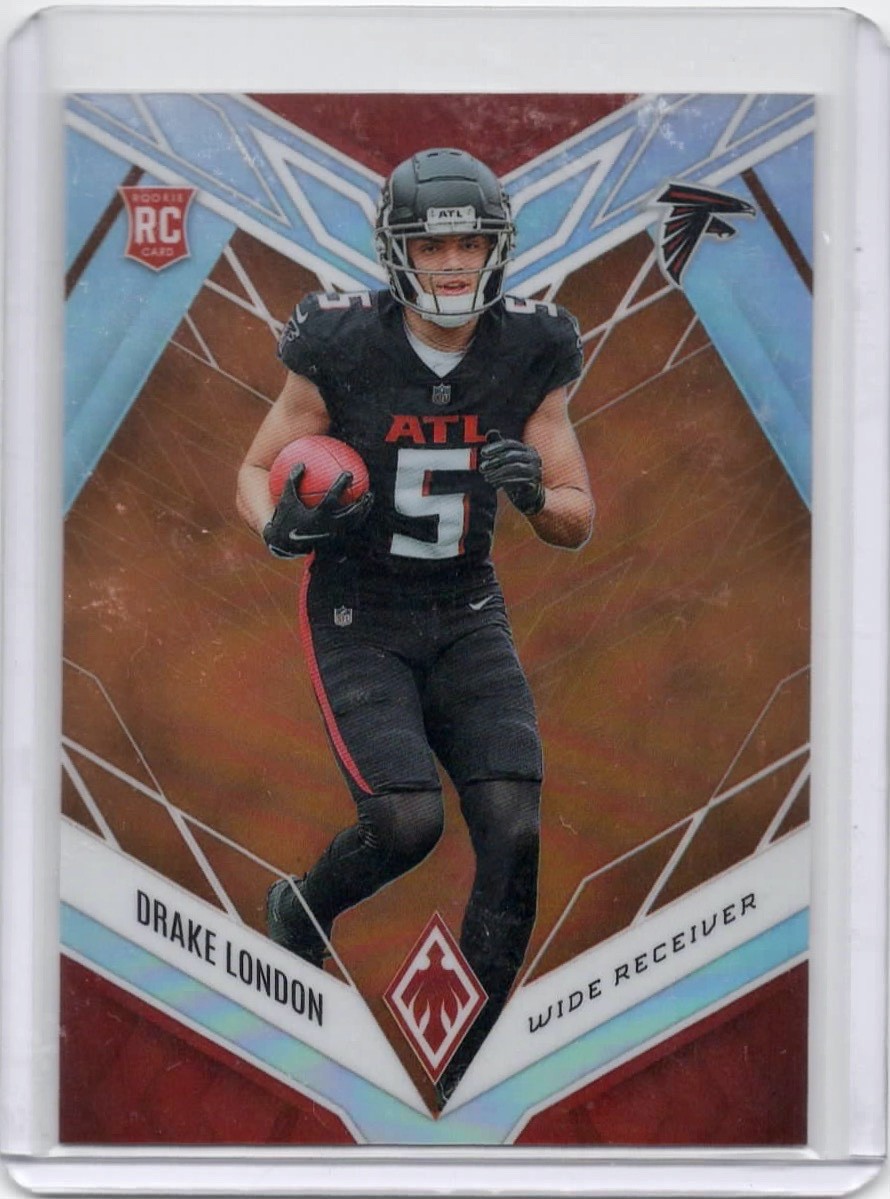 Drake London 2022 Panini Phoenix Rookies Orange /99 #107 Atlanta Falcons SSP