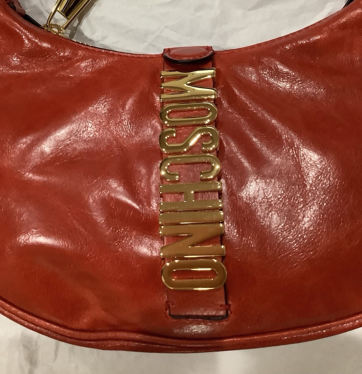 Moschino オルオハロコシャカトフリンシスカフ 50194M5585 001 Moschino Rust Belt Logo Hobo Crescent Shoulder Bag Purse