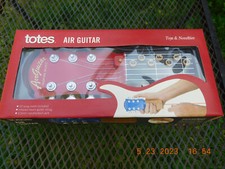  17 TOTES AIR GUITAR NEW IN BOX BATTERIES  OPERATION SPECIFICATIONS INCLUDED