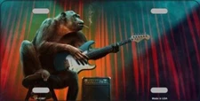 MONKEY PLAYING GUITAR METAL NOVELTY LICENSE PLATE TAG 