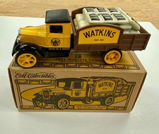 Ertl Collectibles 1931 Hawkeye Truck Watkins Die Cast Coin Bank