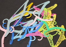  23 VINTAGE DOLL FLEXIBLE PLASTIC HANGERS--2.5" TO 3" WIDE--EXCELLENT