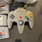 Nintendo 64 pikachu edition + 4 Controllers + 7 Games incredible condition.  — photo 4
