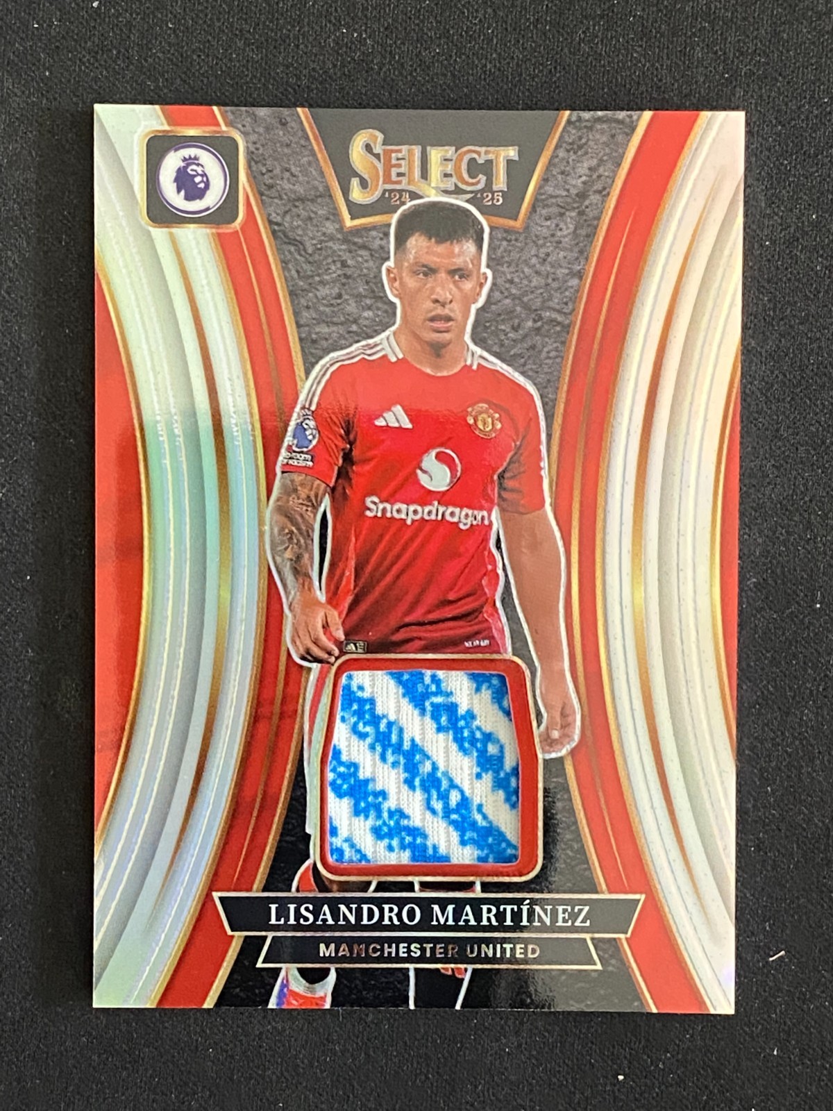 Lisandro Martinez 2024-25 Panini Select Premier League Materials #SM-LM