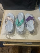 3 Pairs Of New Women  s Flip Flops Size Us Size 9  10 Purple Green Bronze