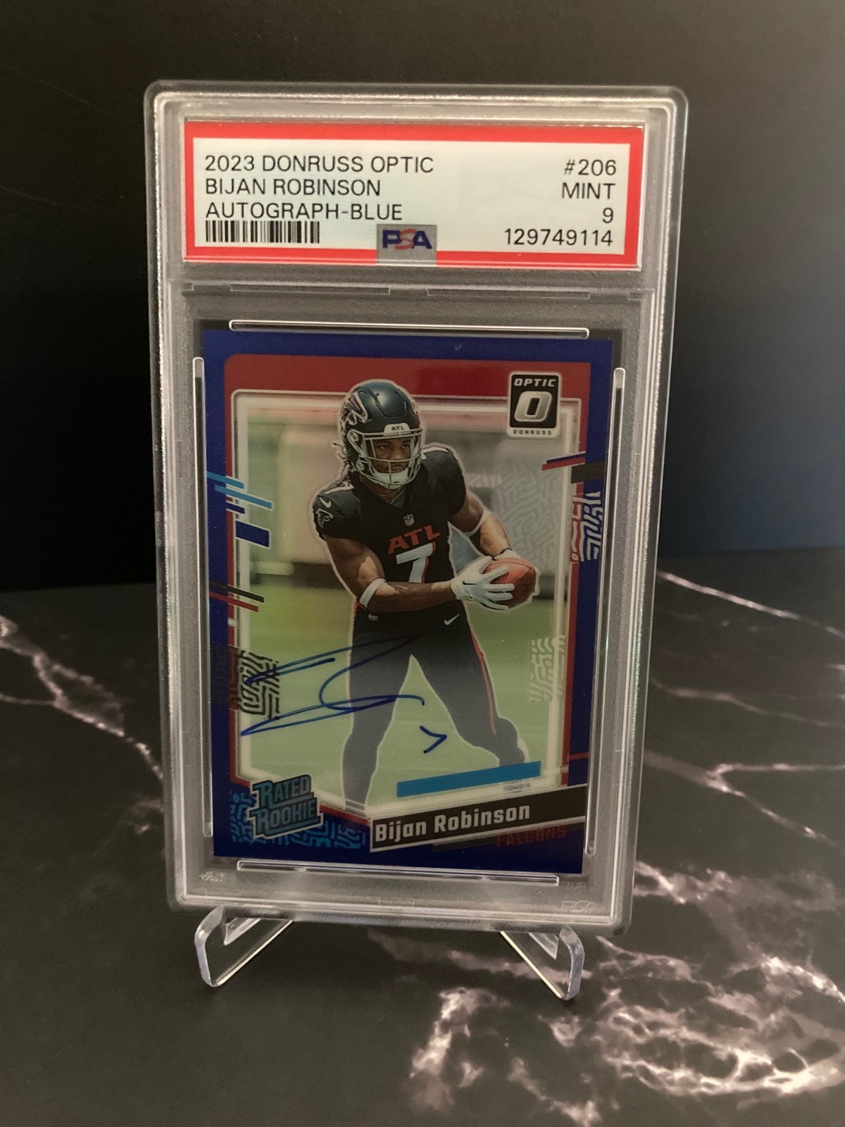 2023 Panini Optic Rated Rookie Bijan Robinson Blue /99 Prizm (RC) Auto PSA 9