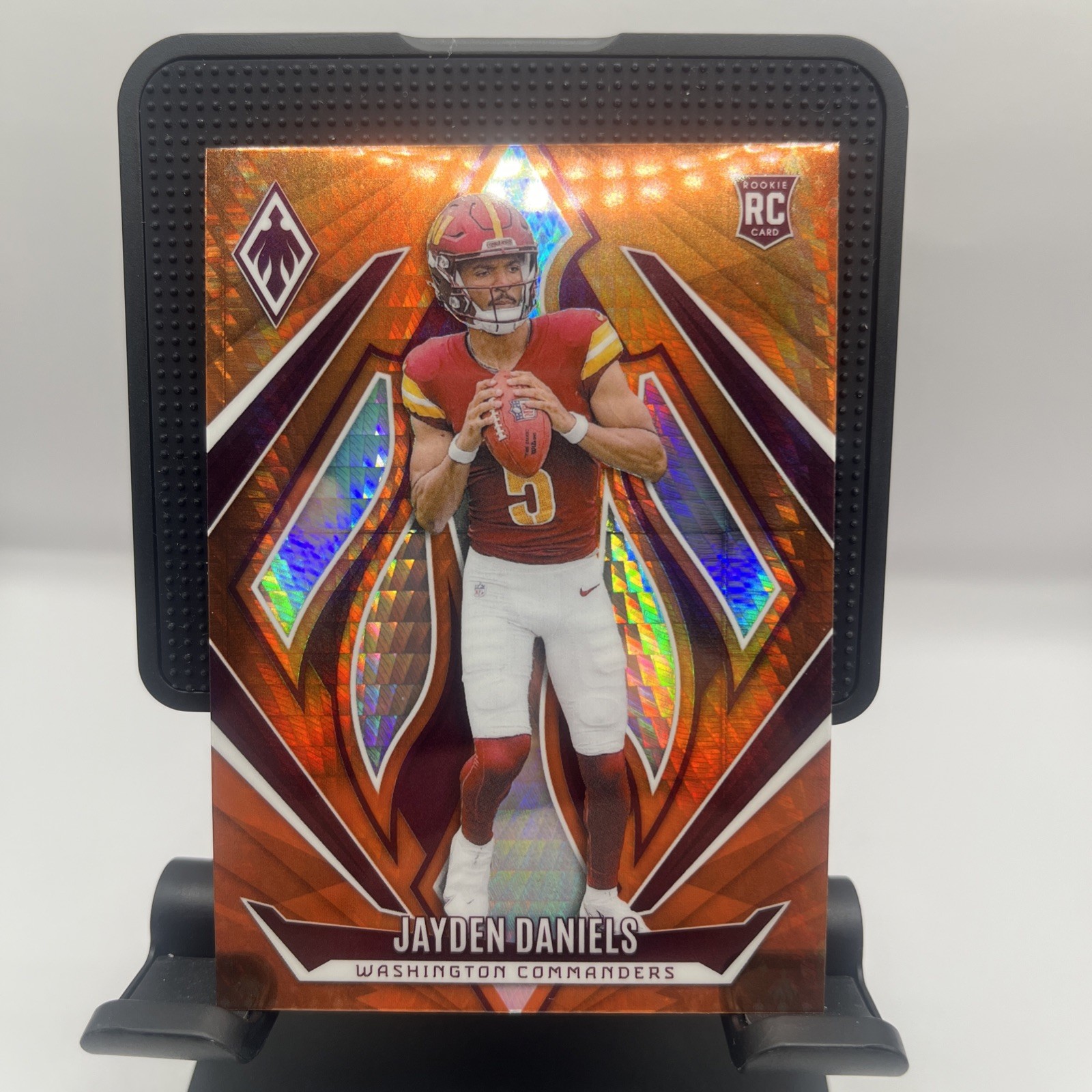 2024 Panini Phoenix - Rookies Jayden Daniels #198 Orange Hyper (RC)