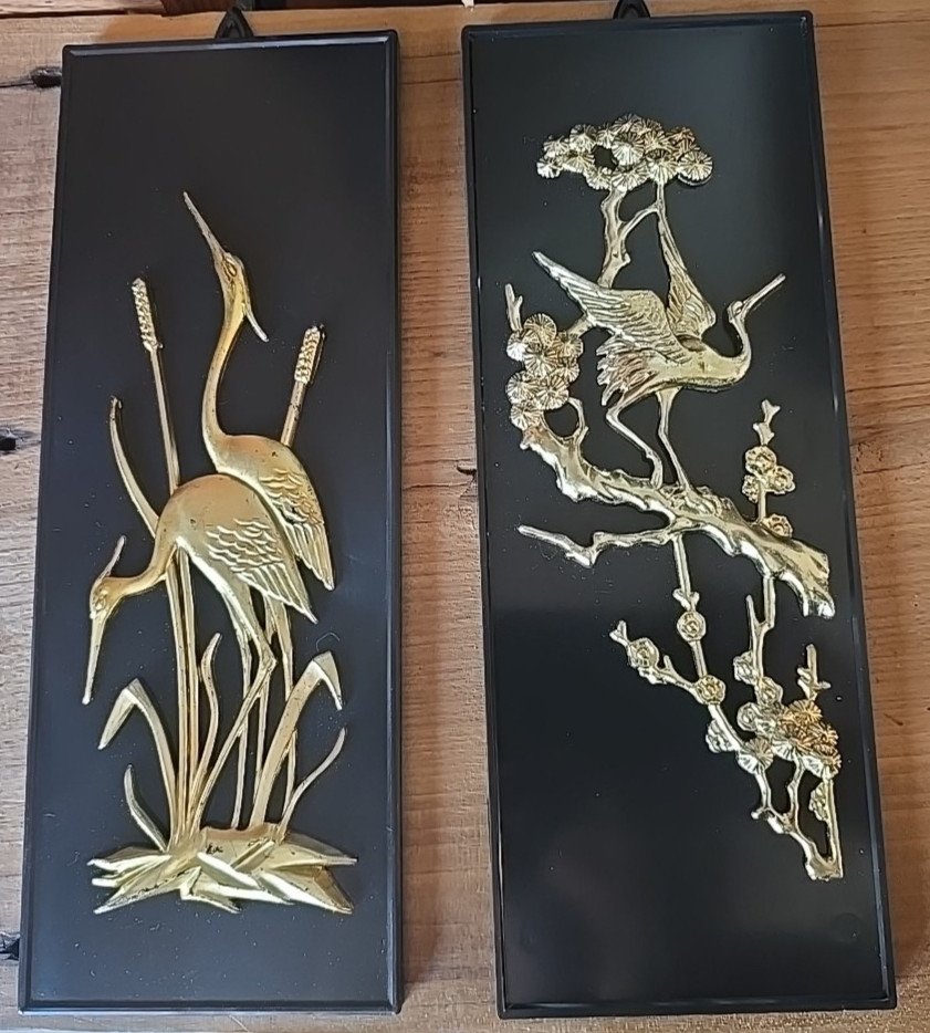 Genuine vintage gold-and-black MCM wall plaques with a graphic heron motif — the kind of retro accent piece that makes a gallery wall instantly interesting.