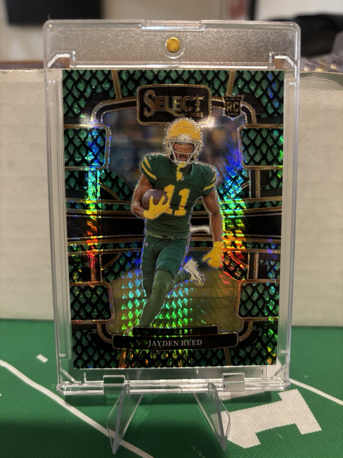 2023 Panini Select - Concourse Jayden Reed #38 Dragon Scale Prizm /70 (RC)