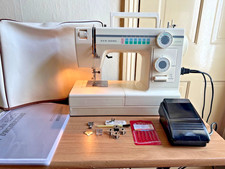 New Home Model 344 Sewing Machine + pedal, soft cover, accessories, manual