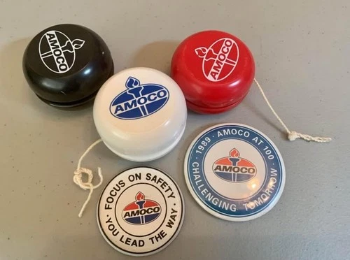 (Set of 5) Vintage Amoco Yo-Yos, button, and magnet