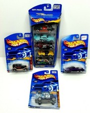 2001 Hot Wheels Lot of 8 All Different and a First Edition. Brand New Sealed