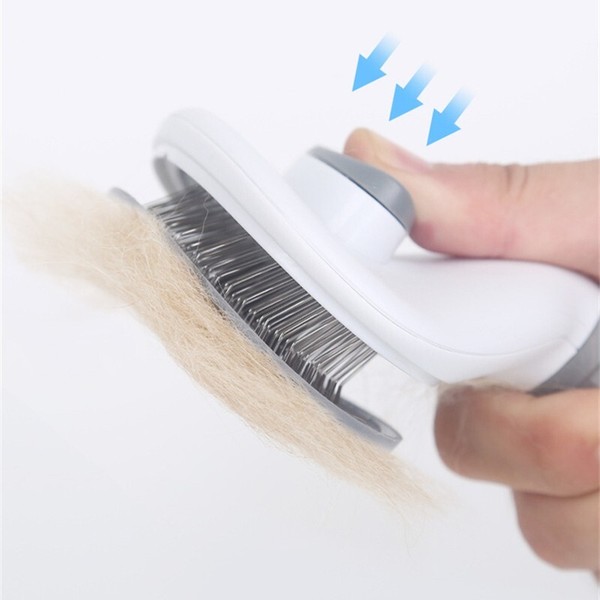 cepillo para mascotas con mecanismo que facilita la retirada del pelo