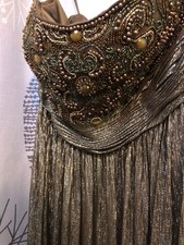 Brown shimmer formal dress, never been worn. Still has tags attached. 