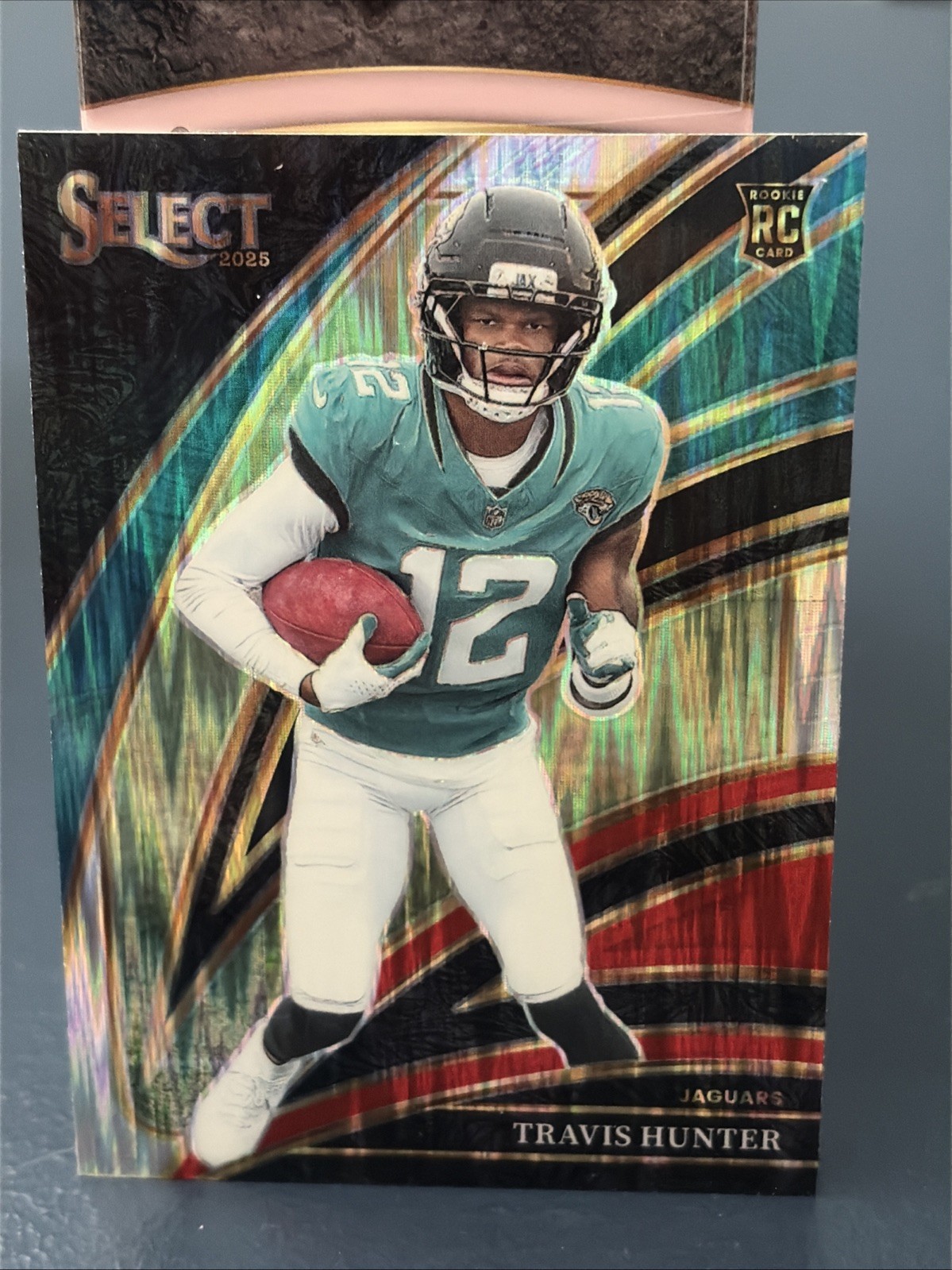 2025 Panini Select Travis Hunter RC Club Hobby Green/Red Shock