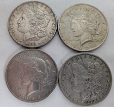 Lot of 4 Investment Circulated Morgan/Peace Silver Dollars