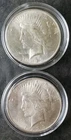Two 1923 $1 Peace Silver Dollars in Capsules
